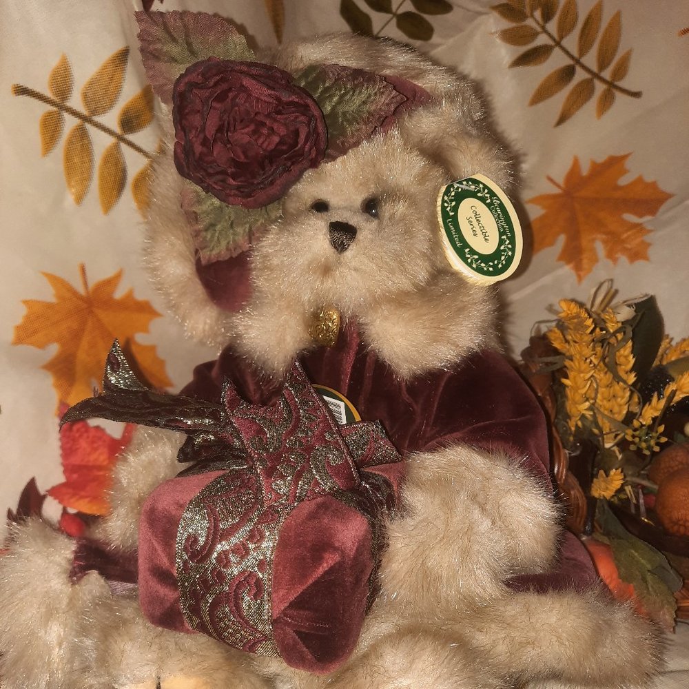Bearington Bear Victoria holding a gift, teddy bear